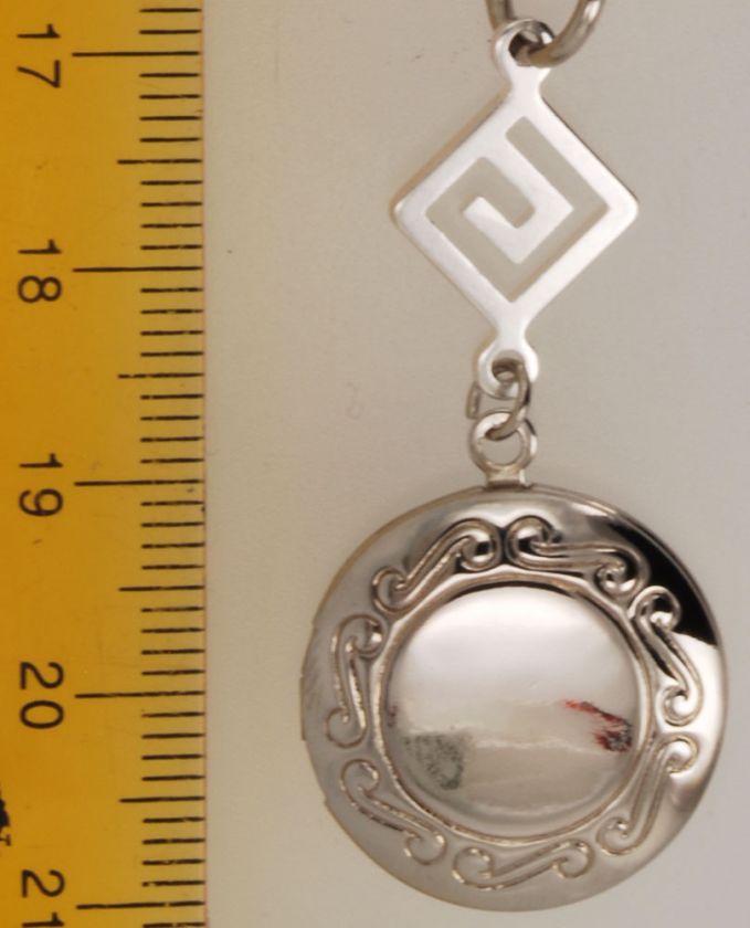 WBM round locket with engraving & Greek key connector  