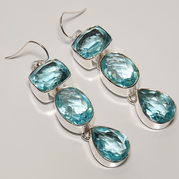 FABULOUS  FACETED SWISS BLUE TOPAZ & .925 STERLING SILVER EARRING 