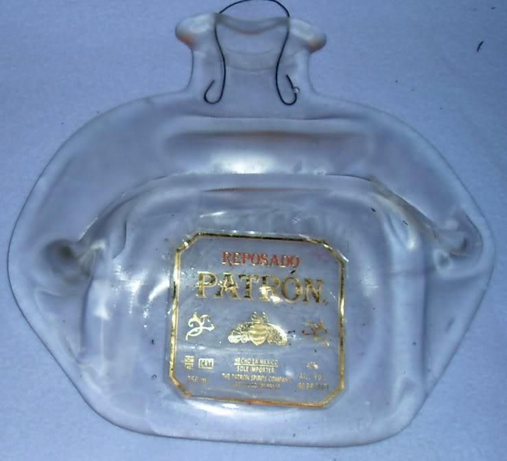 melted flat resposado patron tequila gold bottle  