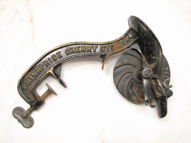   ENTERPRISE CAST IRON HAND CRANK CHERRY STONER PITTER NO 1 GOLD PAINTED