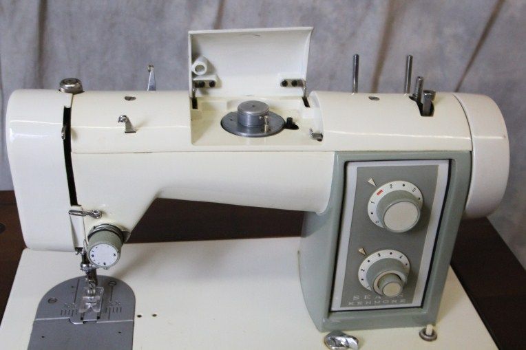 L254  KENMORE SEWING MACHINE WITH TABLE  